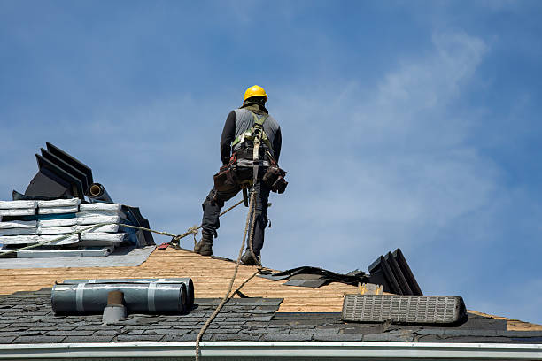 Professional Roofing technician working in Houlka, MS